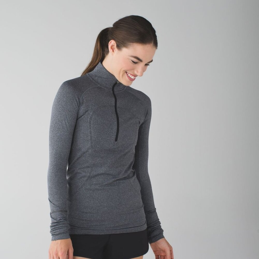 lululemon. Swiftly Tech 1/2 Zip. Long Sleeve Top. Grey Color. Size 8. Womens.